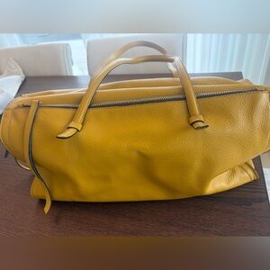 Victoria Napoli Yellow Pebble Leather Handbag.